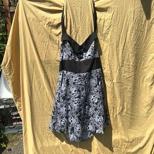 Adorable halter dress with skull/flower pattern. Zipper on side. Light material